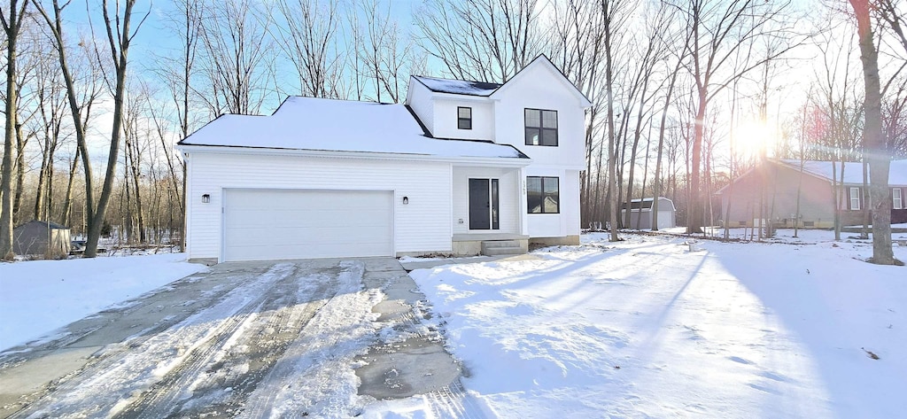 view of front of house with a garage