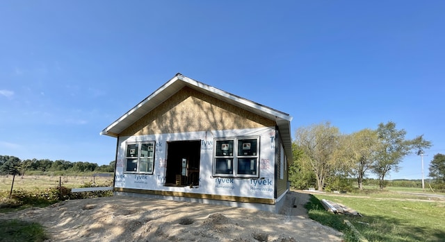 6193 S Pere Marquette Hwy, Pentwater, MI 49449 - view of front of home featuring a front yard and a porch