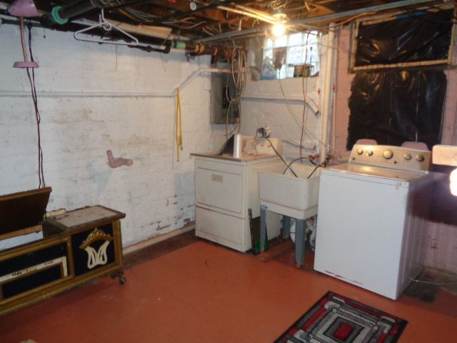 basement featuring washer and dryer