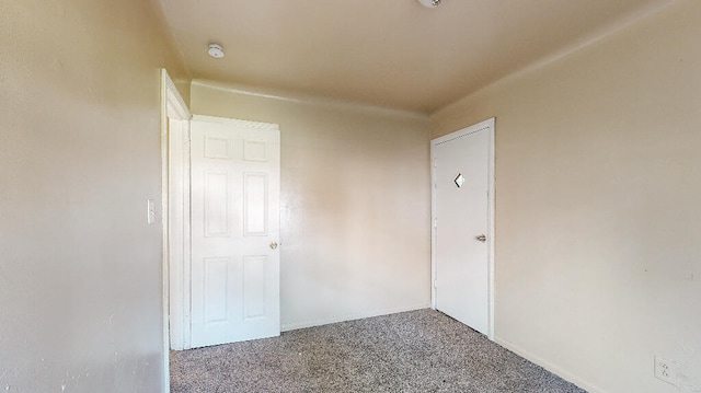 empty room with carpet floors