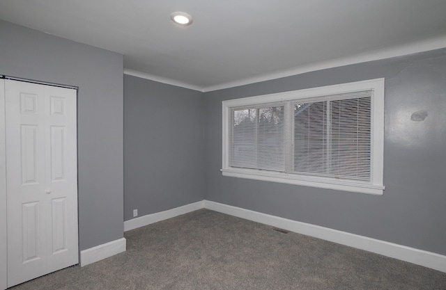 view of carpeted spare room