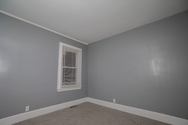 unfurnished room with carpet