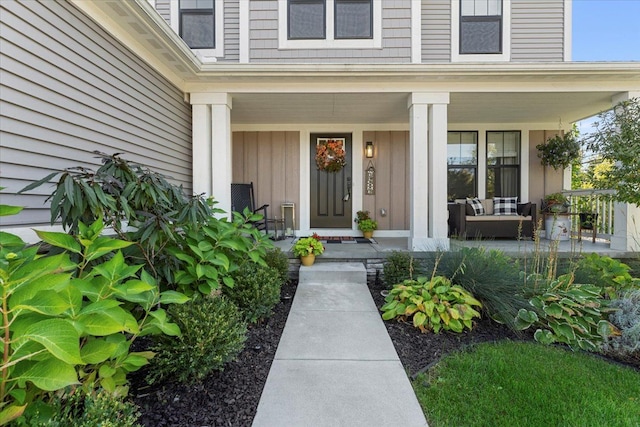 doorway to property with a porch