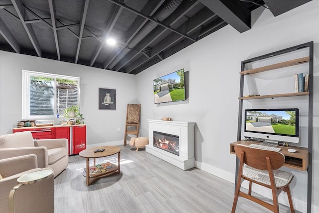 living room with light hardwood / wood-style flooring