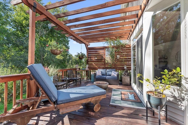 deck featuring an outdoor hangout area and a pergola