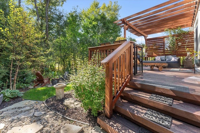 view of yard featuring a pergola, an outdoor hangout area, and a wooden deck