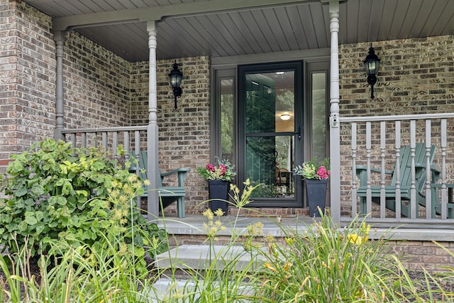 doorway to property with a porch