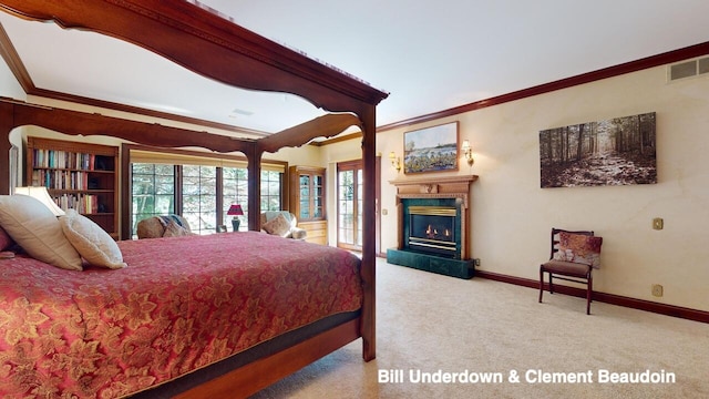 bedroom featuring ornamental molding and carpet flooring