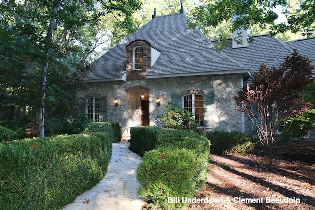 view of french country inspired facade