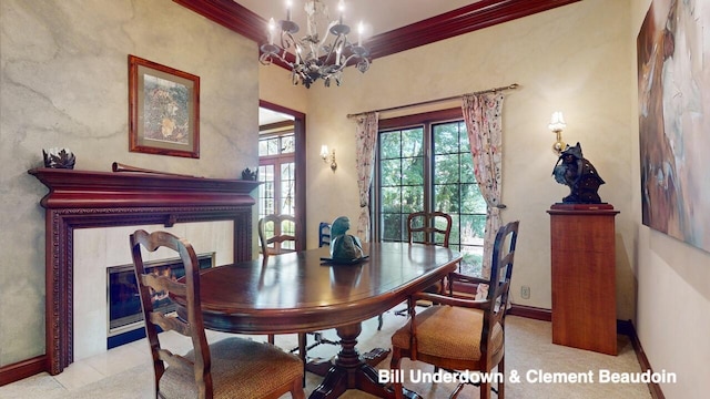 dining space featuring ornamental molding and a chandelier