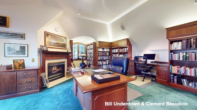 carpeted office with high vaulted ceiling