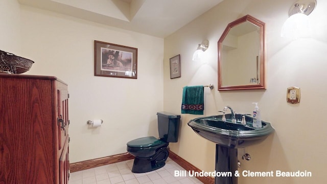 bathroom featuring toilet