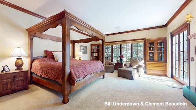 carpeted bedroom featuring ornamental molding and access to exterior