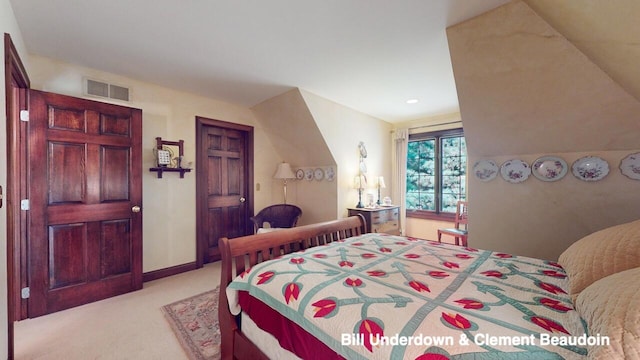 bedroom featuring light colored carpet