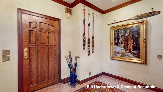 foyer entrance featuring crown molding and light tile patterned floors