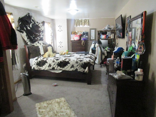 bedroom featuring light colored carpet