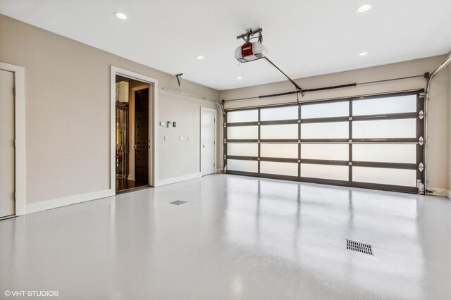 10 Peninsula Dr, New Buffalo, MI 49117 - garage featuring a garage door opener, recessed lighting, and baseboards