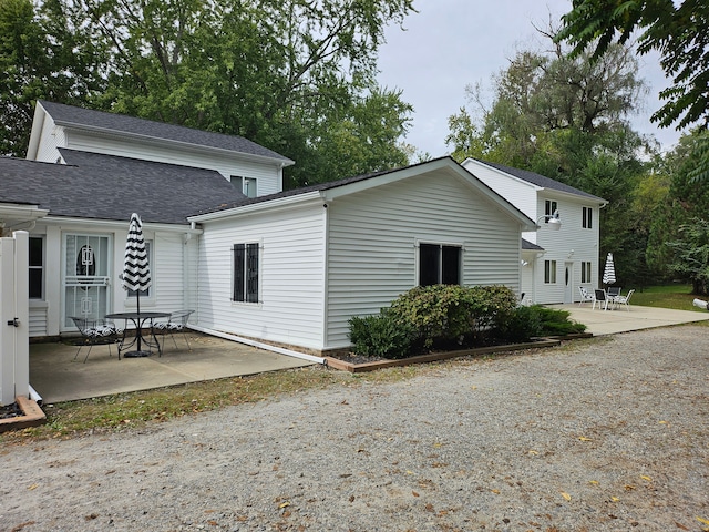 rear view of property with a patio area