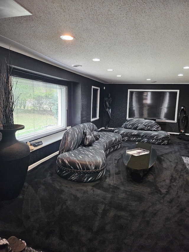 bedroom with carpet and a textured ceiling