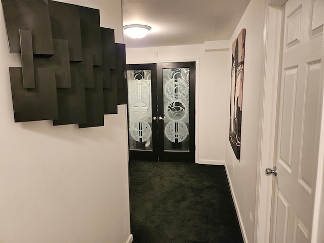 interior space featuring dark colored carpet and french doors