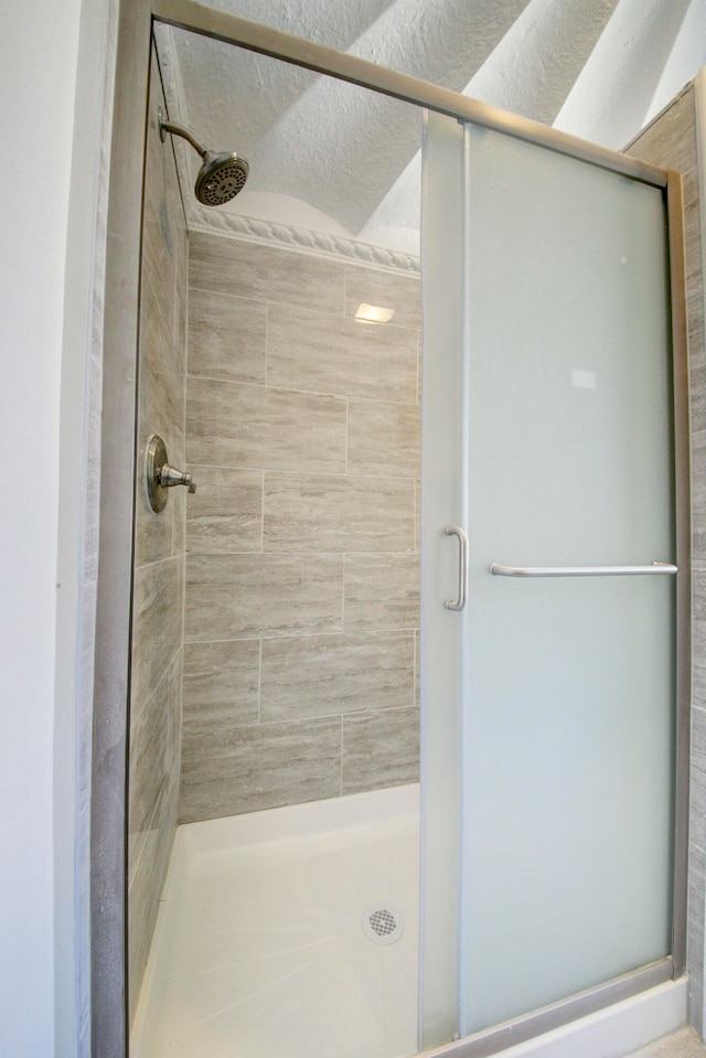 bathroom featuring walk in shower