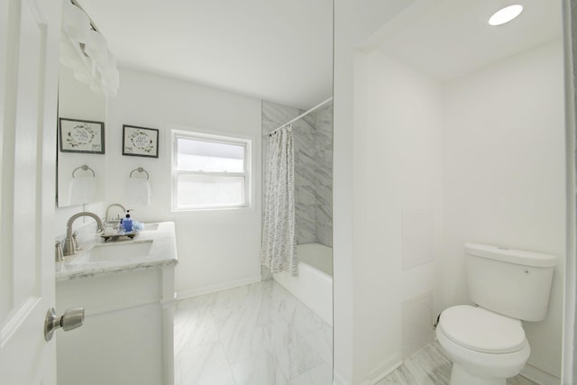 full bathroom featuring vanity, toilet, and shower / bath combo