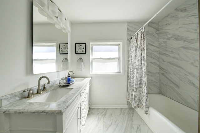 bathroom featuring vanity and shower / bathtub combination with curtain