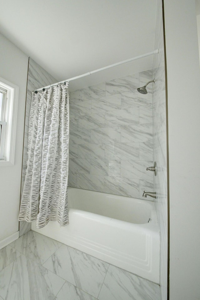 bathroom featuring shower / bath combination with curtain