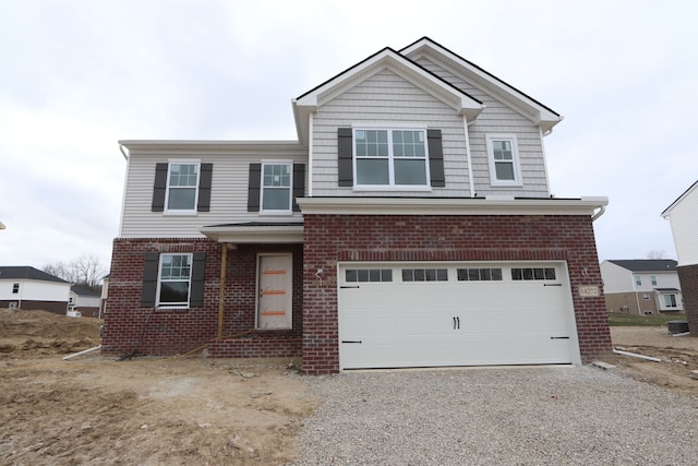 view of property featuring cooling unit and a garage