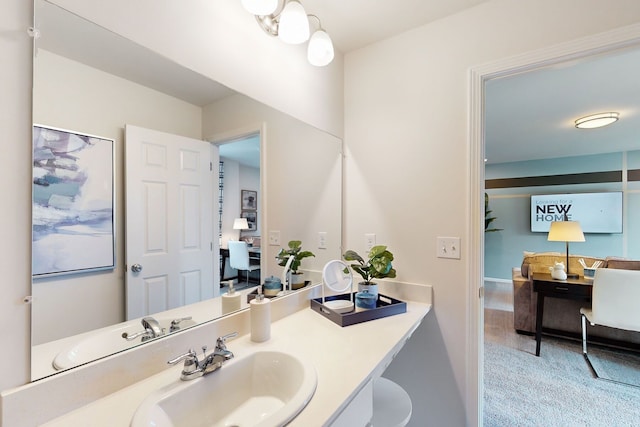 bathroom with vanity and ensuite bathroom