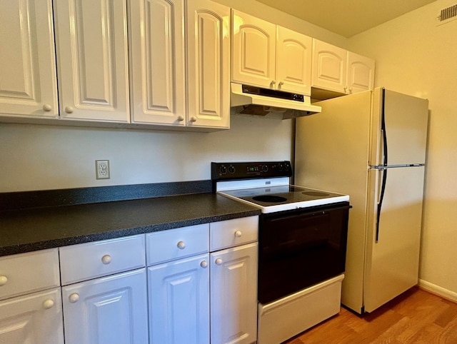 kitchen with white cabinetry, light hardwood / wood-style floors, and white appliances