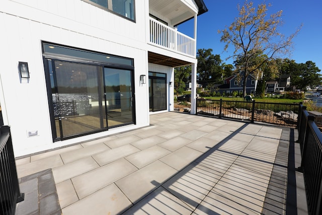 view of patio with a balcony