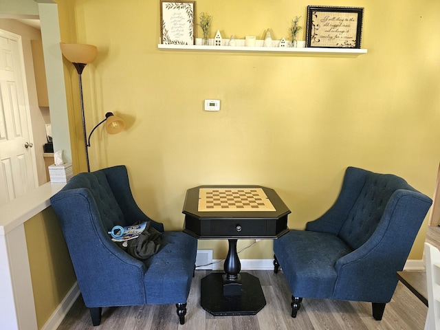 living area featuring dark wood-type flooring