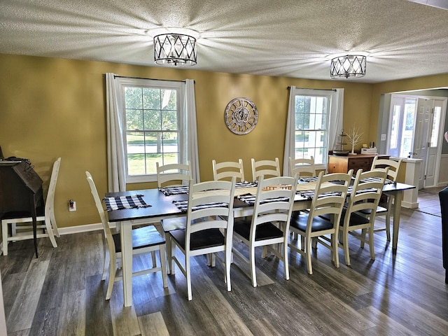 dining space with dark wood-type flooring