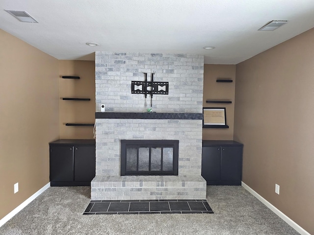 unfurnished living room with dark carpet