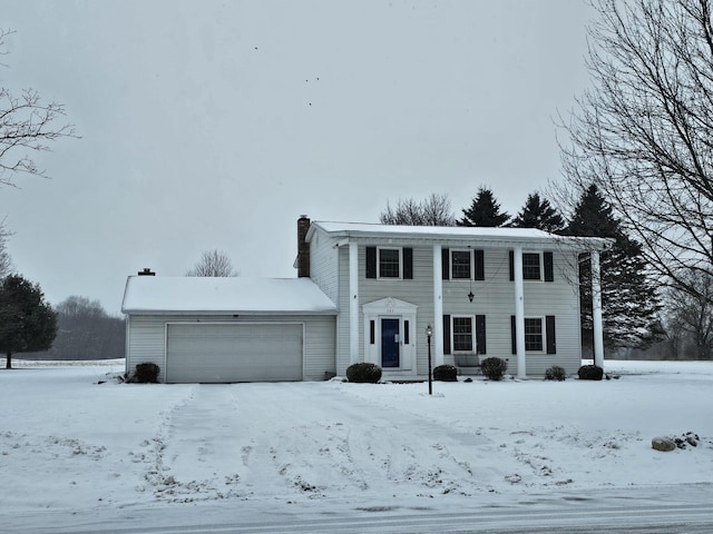 view of front of property with a garage