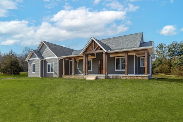 view of front of home featuring a porch and a front yard