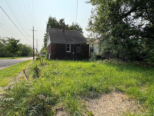 15379 Dolphin St, Detroit, MI 48223 - view of home's exterior featuring brick siding