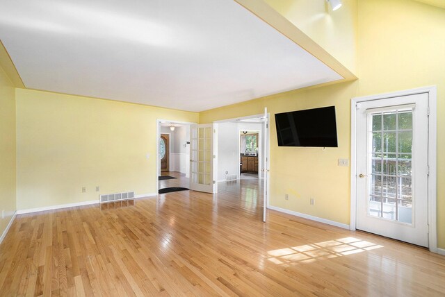 507 Lena Dr, South Haven, MI 49090 - spare room featuring healthy amount of natural light, light wood finished floors, and baseboards