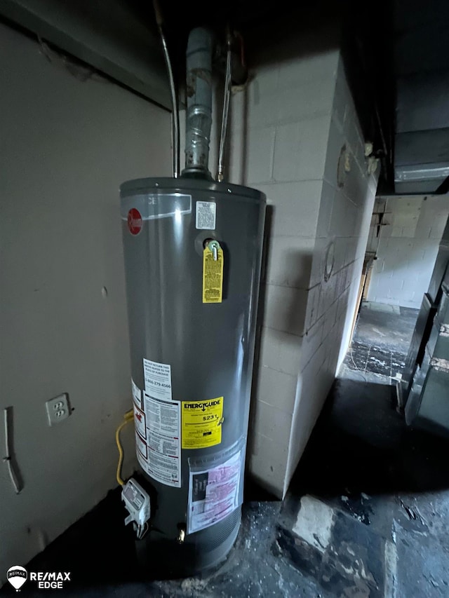 utility room featuring gas water heater