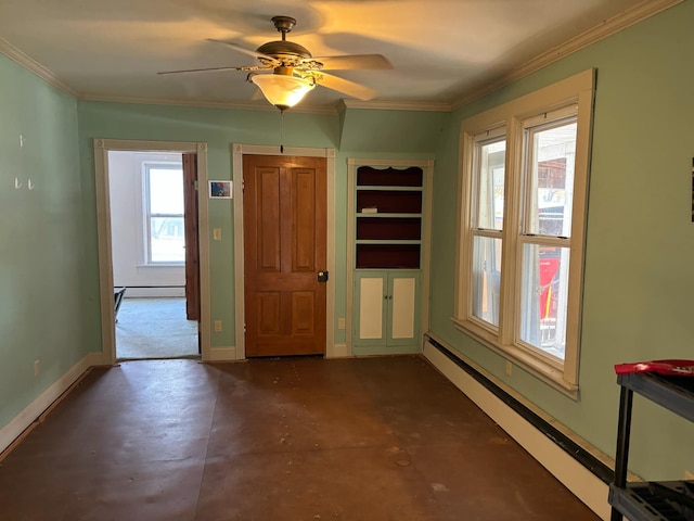 empty room with plenty of natural light, ceiling fan, ornamental molding, and baseboard heating