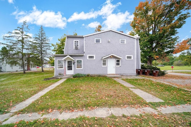 front of property featuring a front lawn