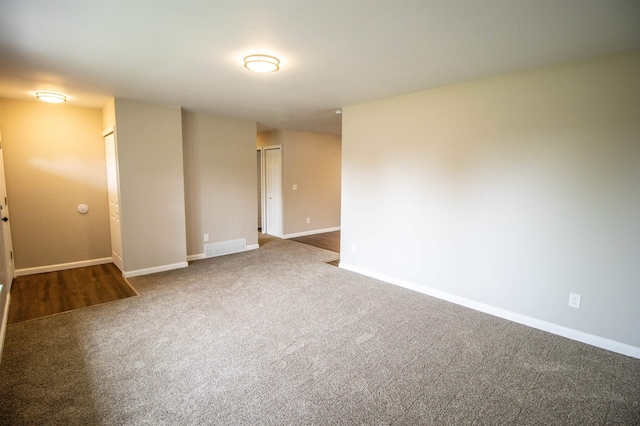 spare room with carpet