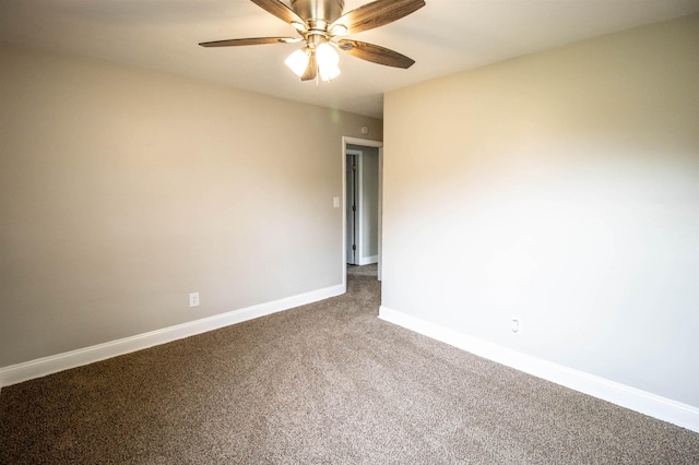 7029 Silver Lake Rd, Linden, MI 48451 - carpeted spare room with baseboards and ceiling fan
