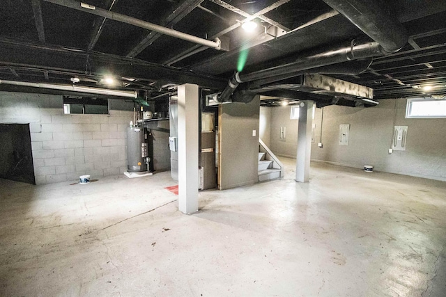 7029 Silver Lake Rd, Linden, MI 48451 - below grade area featuring gas water heater and stairway
