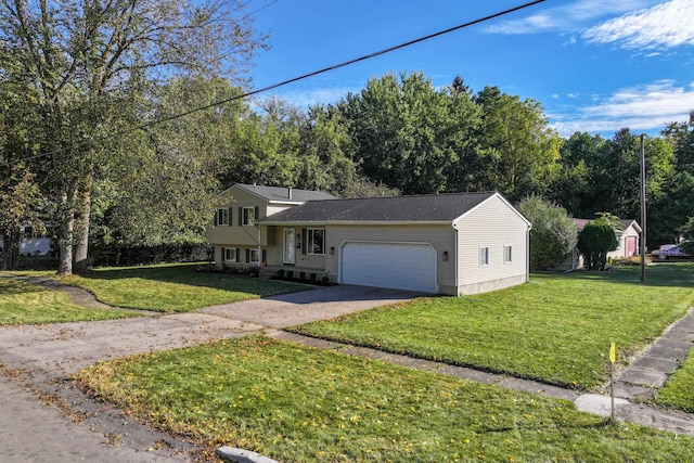 tri-level home with a front yard and a garage