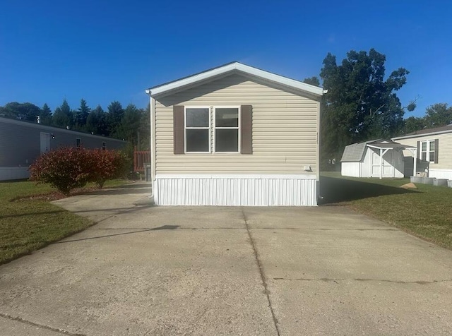 view of home's exterior featuring a yard