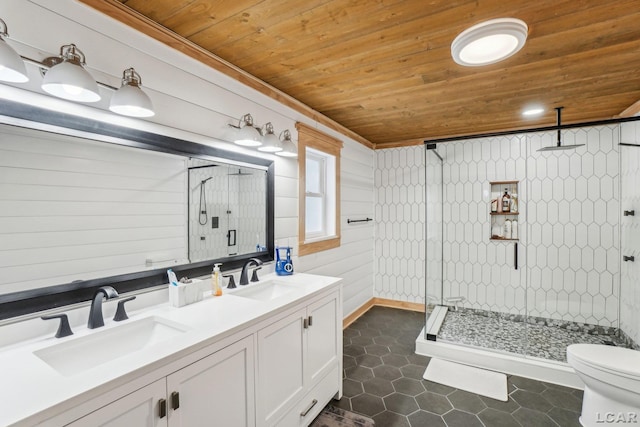 bathroom featuring tile patterned flooring, an enclosed shower, vanity, wooden ceiling, and toilet