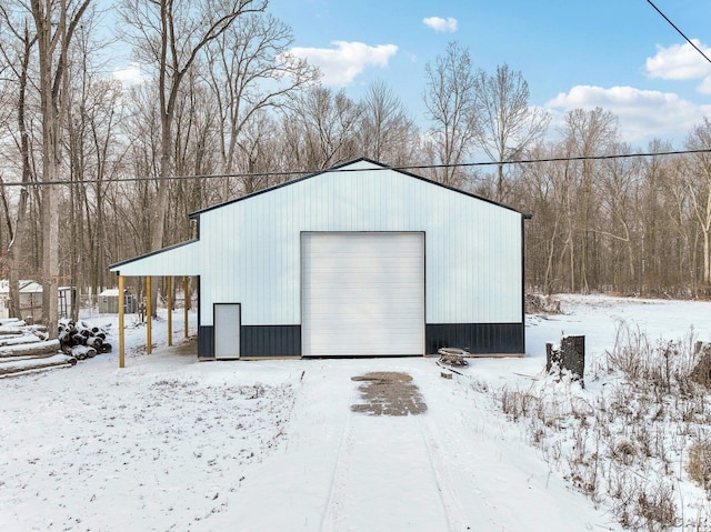 view of snow covered garage