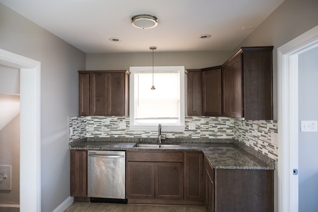 kitchen featuring decorative backsplash, dark brown cabinets, stainless steel dishwasher, and sink